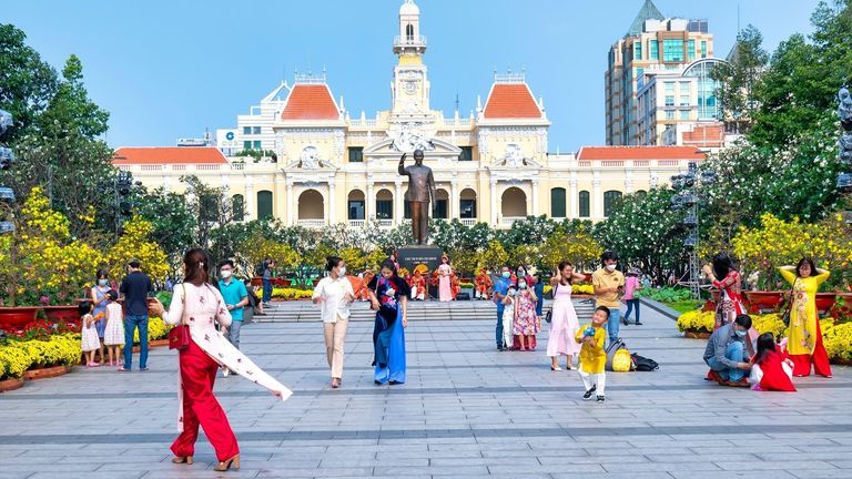 Vietnamese tend to wear vibrant and beautiful attire during Tet. | Source: Shutterstock