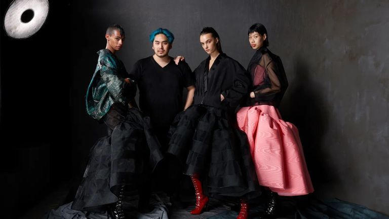 Bach Mai and his models. | Photo: Dimitri Hyacinthe / Courtesy of Bach Mai