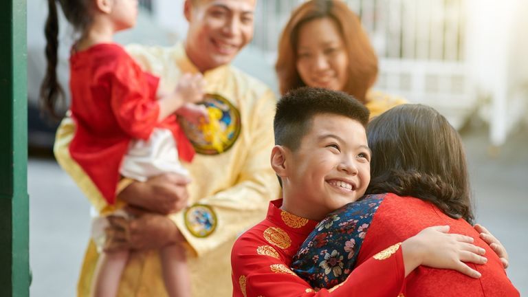 Exchanging Tet wishes is a beautiful Vietnamese tradition. | Souce: Shutterstock