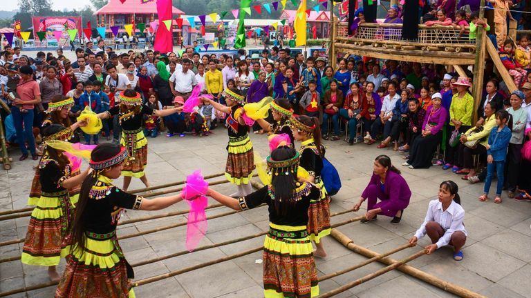 Hmong ethnic group perform traditional dance to worship Hung Kings. | Source: Shutterstock
