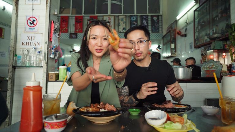 From left to right: Kavi and Peter having dodging beef at Bò Né Cô Tuyền | Source: Vietcetera