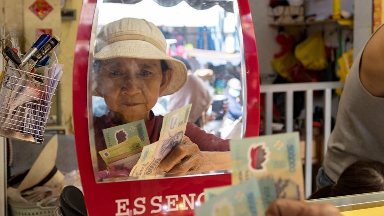 Rising Remittances From Overseas Vietnamese Boosts Currency Stability