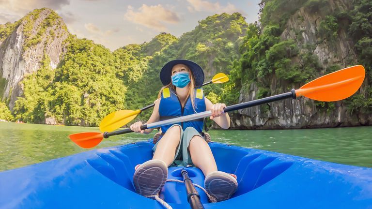 Experts indicate future tourism trends broken down into four groups including travel trends, planning and booking, contactless technology, and destination trends. | Source: Shutterstock