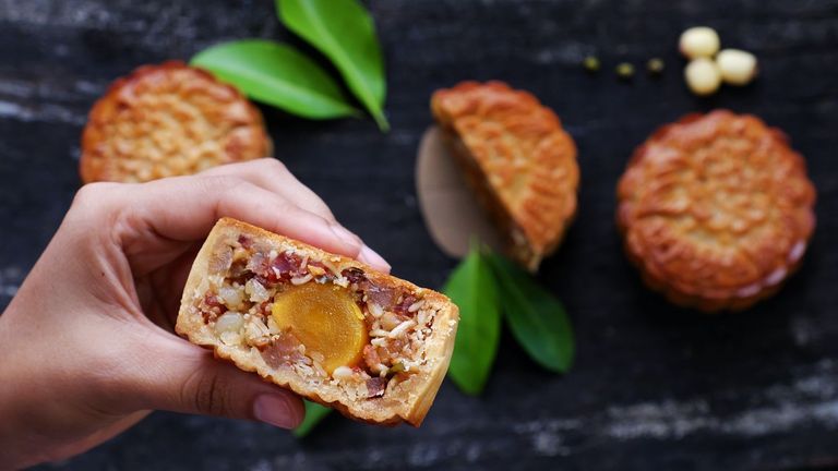 One of the joys of indulging in mooncakes is the delightful surprise concealed beneath the crust. | Source: Shutterstock